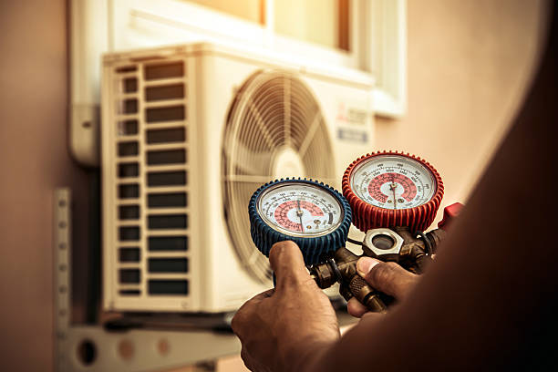 Professional Hvac technician working in Boylston, MA